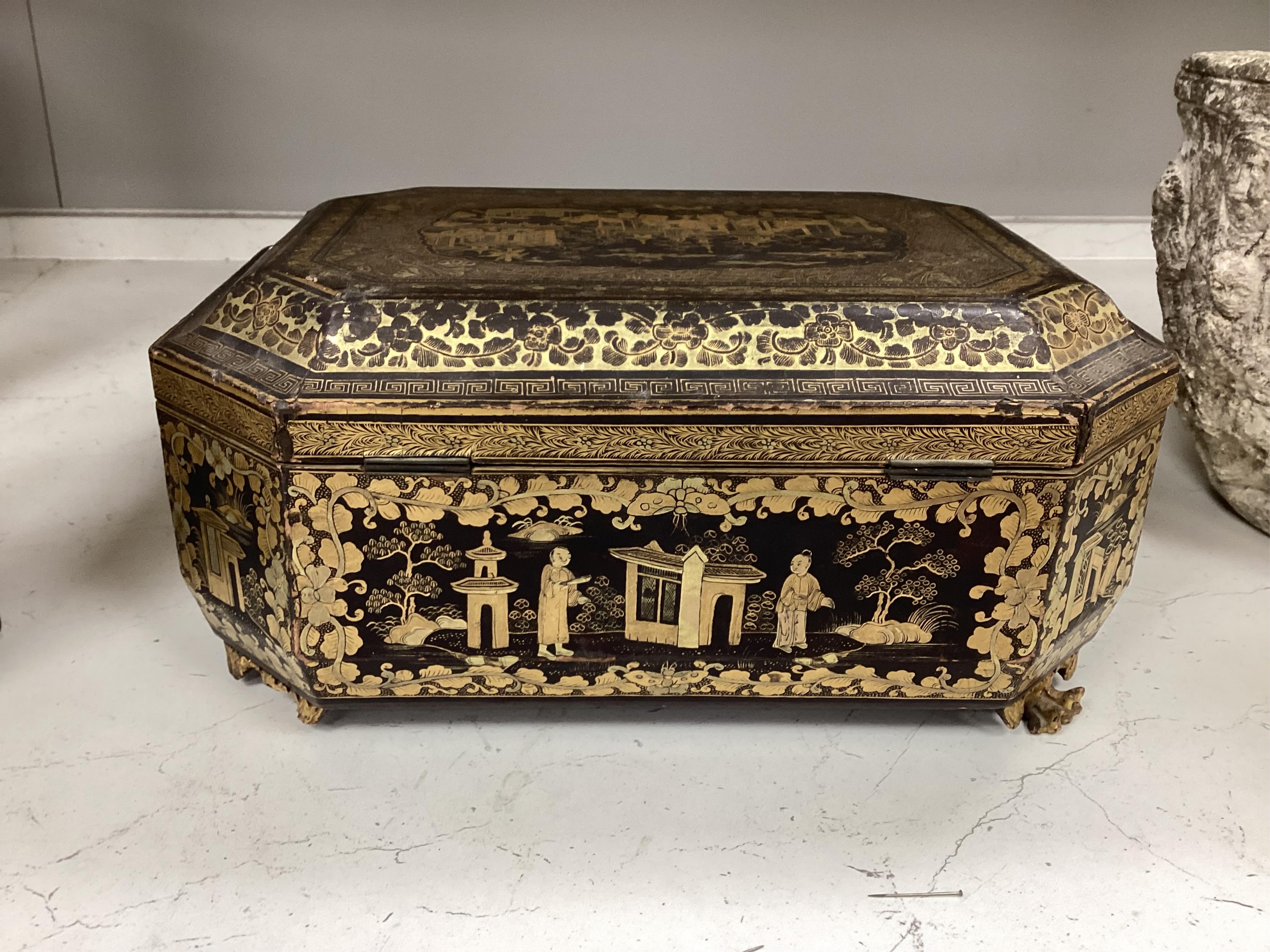 A Chinese export octagonal lacquered work box with fitted interior, 35cm wide